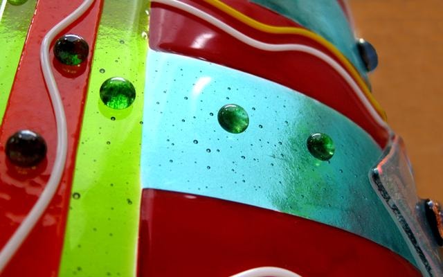 Iron Fuser 4 Moroccan Bazaar detail — closeup showing green glass beads and turquoise stripe with fine texture.