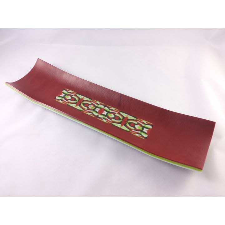 Long tray with leather finish created using a sandblaster