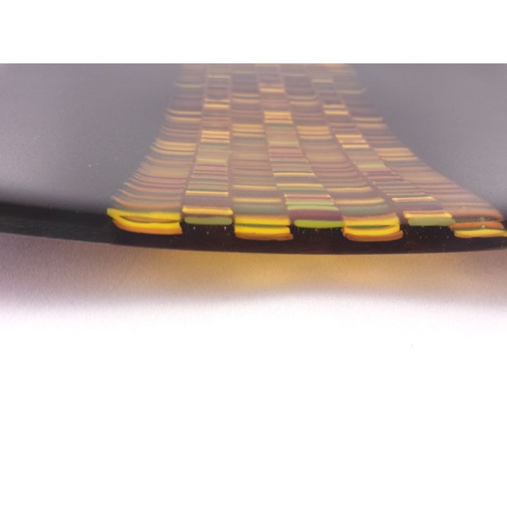 Enlarged view of the end of a channel plate using the tapestry method